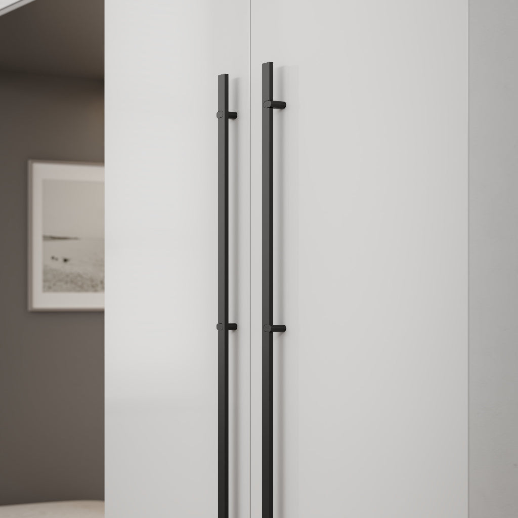 metal cabinet pulls mounted on white cabinetry