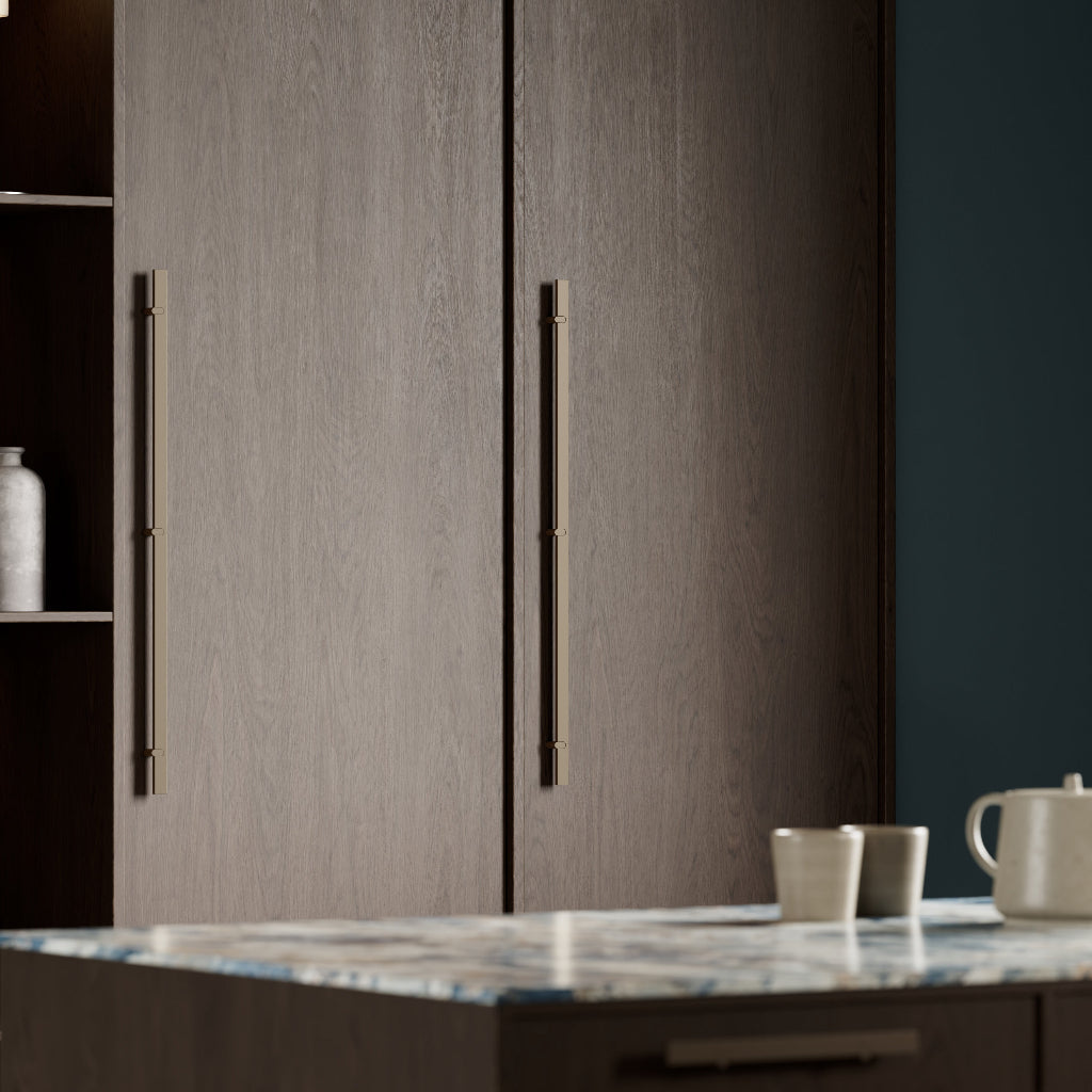 Wood cabinetry with slim brushed metal cabinet pulls