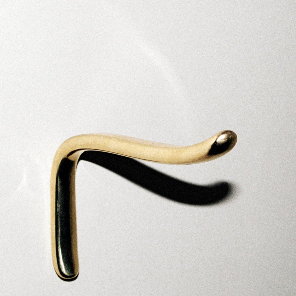 L shaped hook in polished brass, side view.