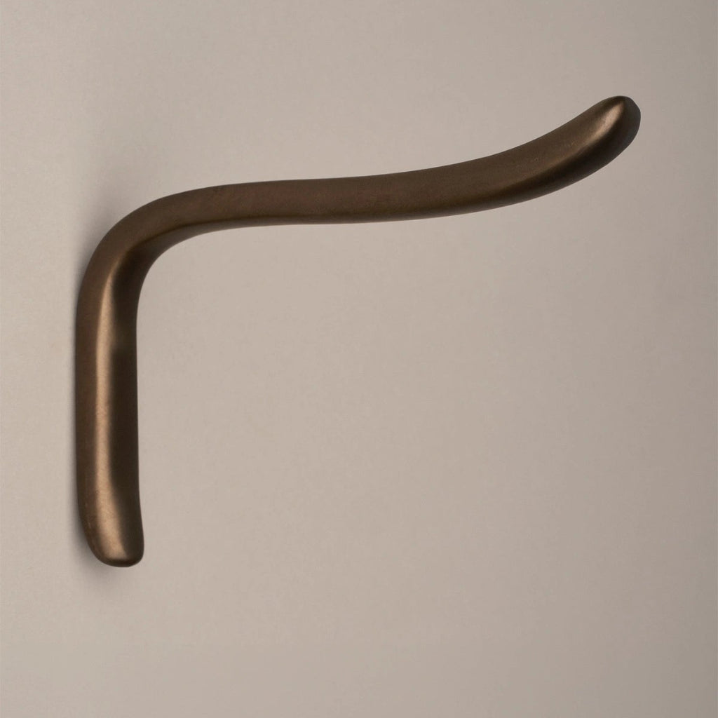 L shaped hook in dark brass, side view.