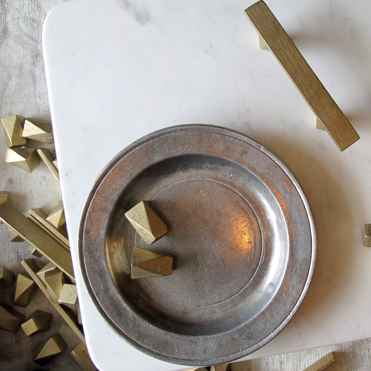 Cast Bronze Handles in the Geo series by contemporary hardware designer Shayne Fox. Made in Toronto.