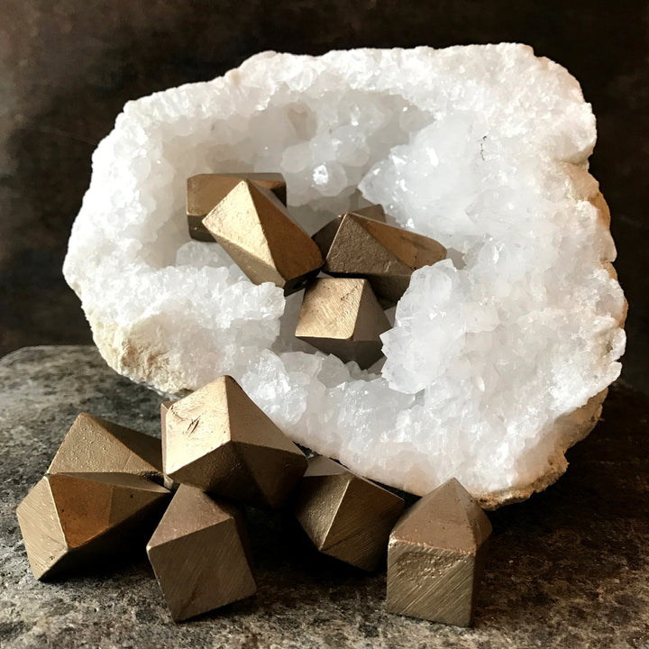 A Shayne Fox Geo Knob/Hook with a bunch of cubes on top of it.