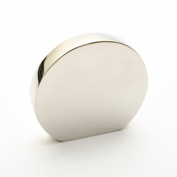 A close up of a Baccman Berglund Globe Knob on a white surface.