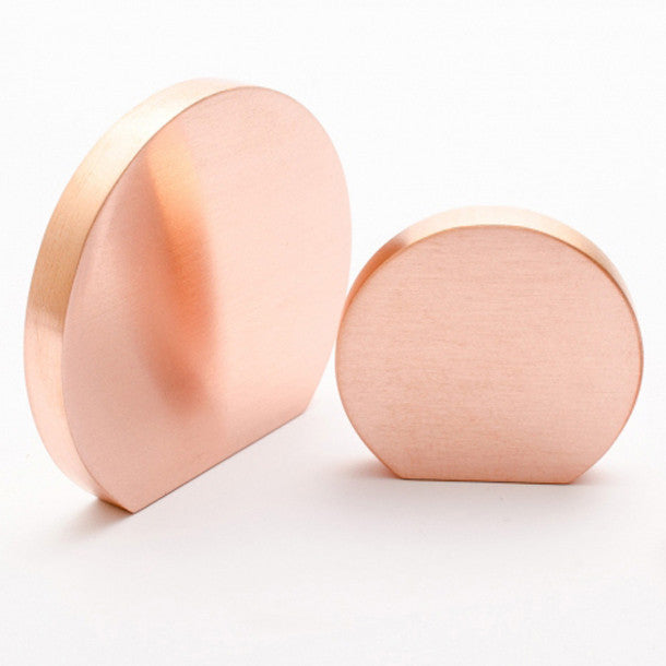 Beautiful semi circular shaped knobs. In solid brushed copper and various other finishes.