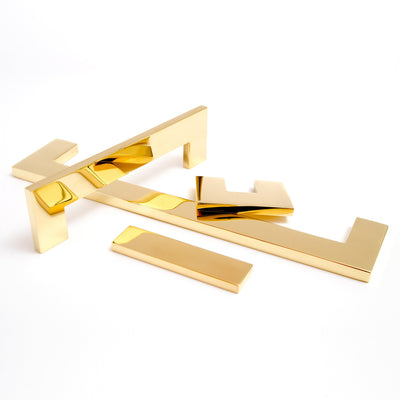 Clean and modern brass handles. Rectangular in shape. Made in Sweden.