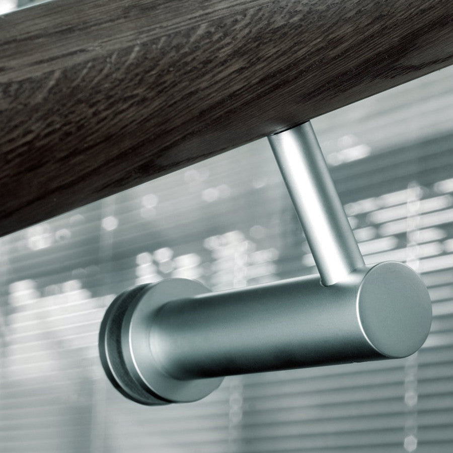 A close up of a window with Halliday Baillie HB 520 Handrail Brackets in the background.