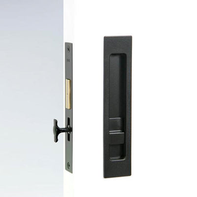 A close up of a Halliday Baillie HB 690 Flush Pull Privacy Lock on a door.