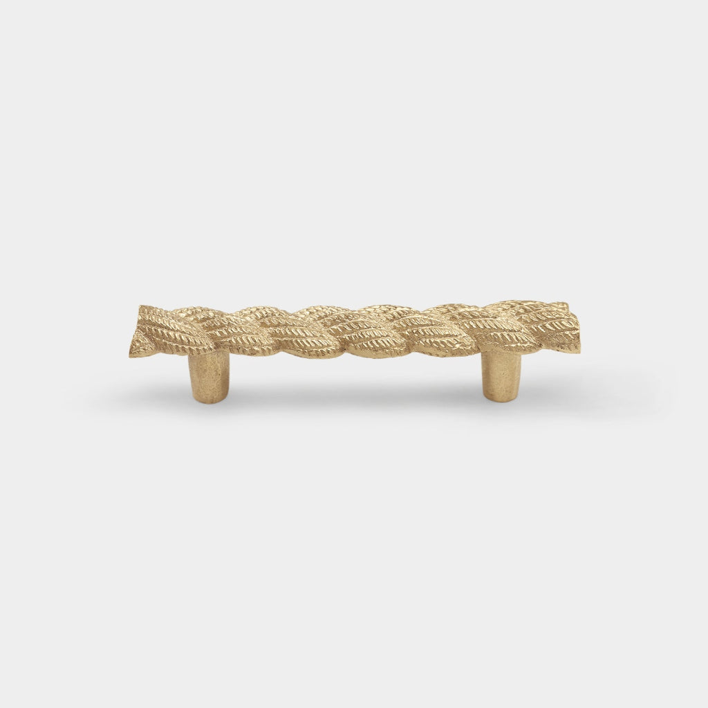 Inspired by André Frechet’s Art Deco style, this brass pull features a refined braided motif, adding tactile texture and architectural elegance to cabinetry.
