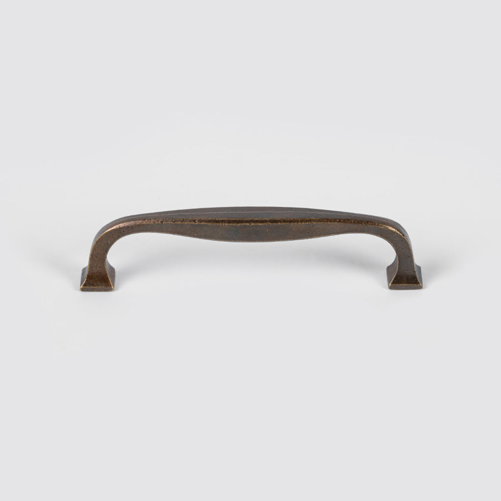 Inspired by Pierre Legrain, this solid brass pull features a sleek modernist design that adds timeless elegance to cabinets, drawers and furniture.
