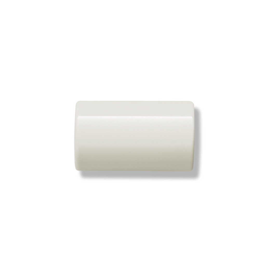 Cream Hewi house hyphen, a short rounded dash for wall mounting.