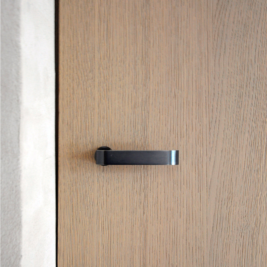 Clean and Modern Jules Door Lever Handle in Cast Iron