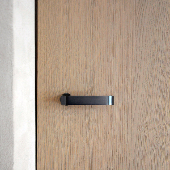 Clean and Modern Jules Door Lever Handle in Cast Iron