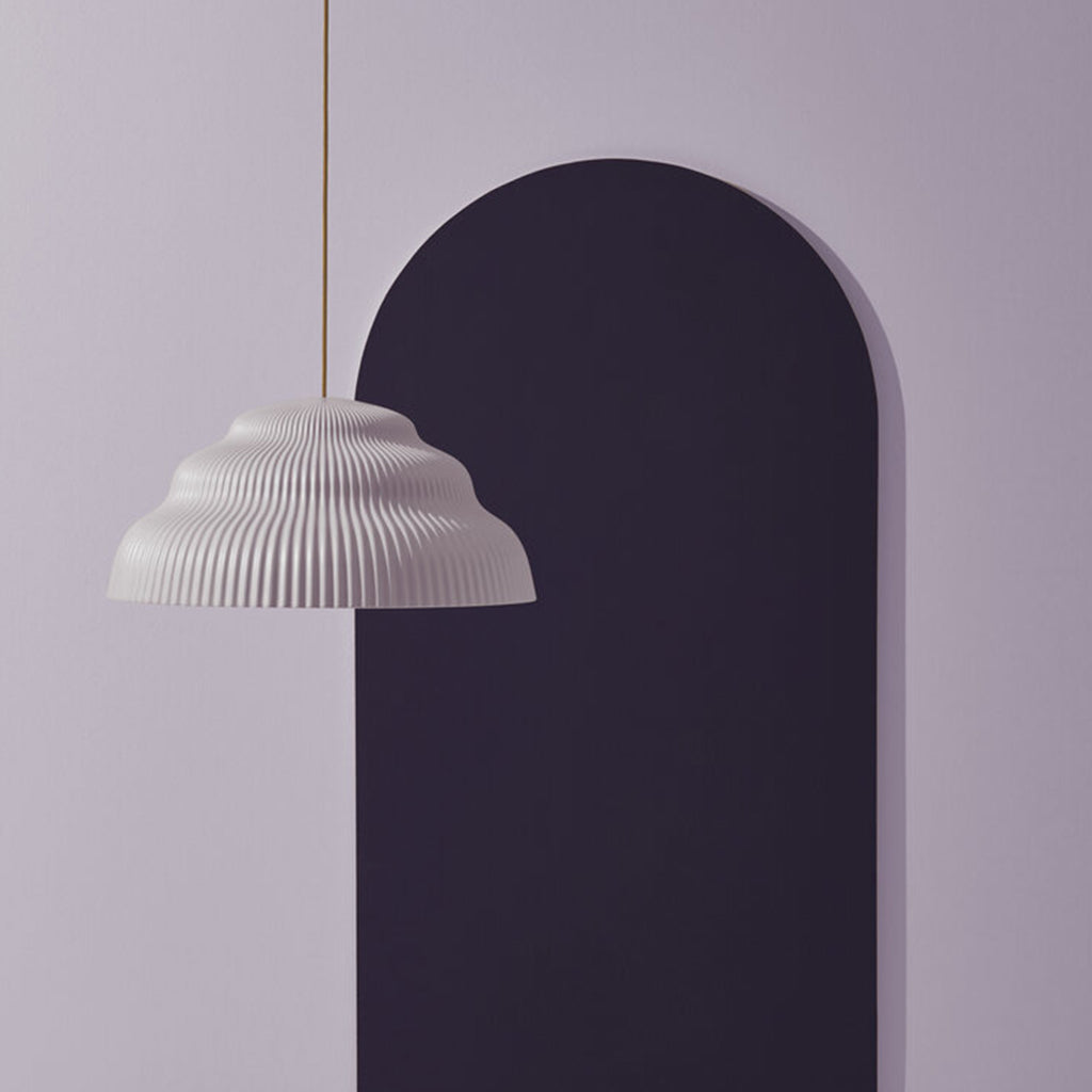 Ceramic hand cast pendant light.