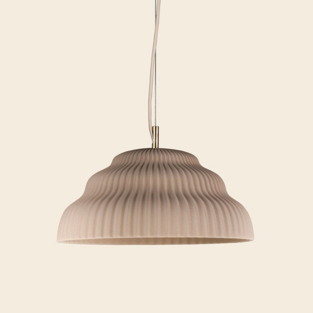 Ceramic hand cast pendant light.