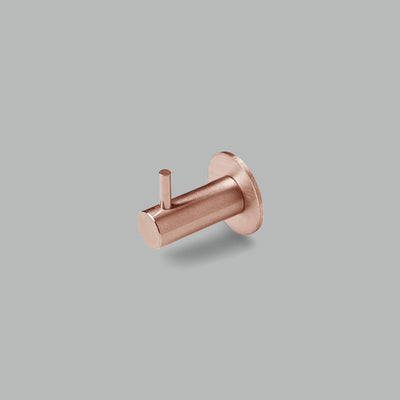 A dline knud coat hook with pin in satin copper.