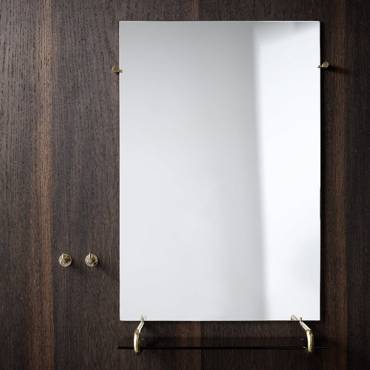 The Knud Mirror Shelf is part of the sanitary line by d line. Available in a variety of finish options, this mirror/shelf combo is modern and refined.