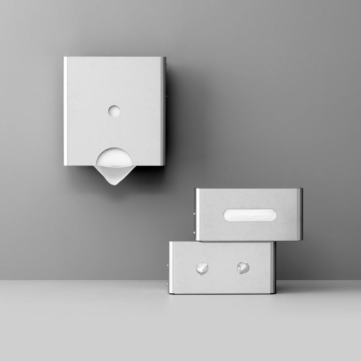 Expertly crafted by hand, the Knud Paper Towel Dispenser provides a modern and sleek aesthetic for any bathroom.