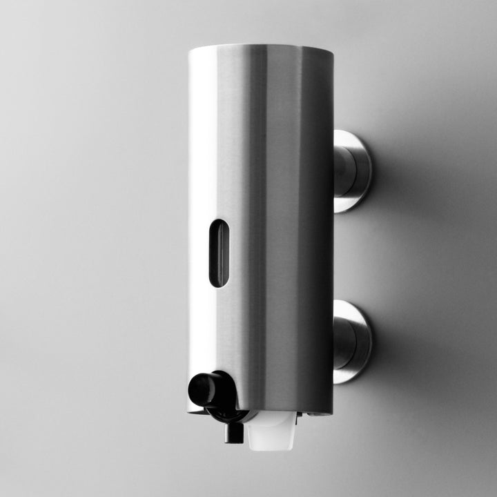 The Knud Soap Dispenser is part of the sanitary line by d line and is available for residential or commercial use.  Available in a variety of finishes including polished or satin stainless steel.