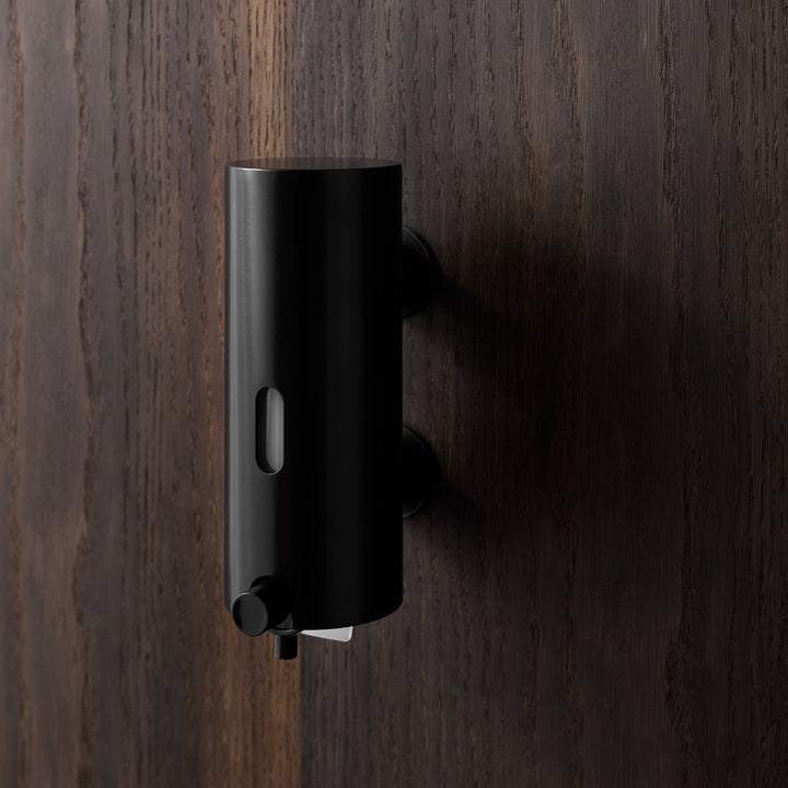 The Knud Soap Dispenser is part of the sanitary line by d line and is available for residential or commercial use.  Shown here in black.