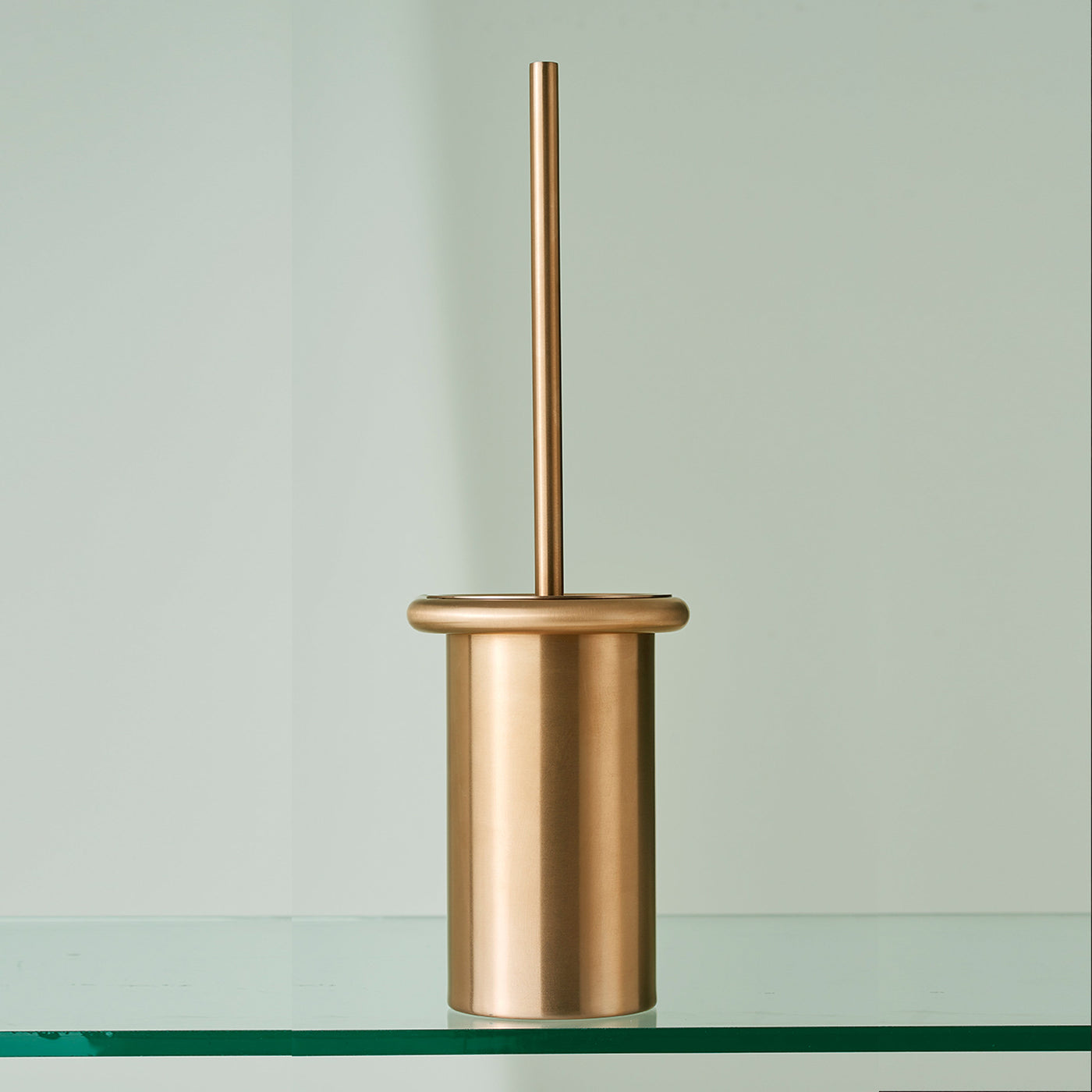 The Knud Toilet Brush Holder is part of the sanitary line by d line and is available in a variety of finishes, including copper and brass.