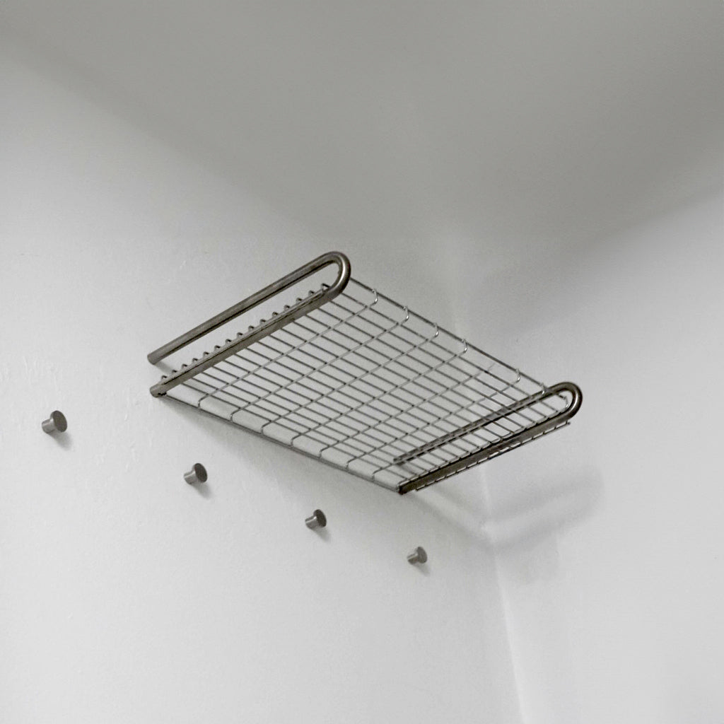 The Knud Towel Shelf is a modern and sleek addition to the sanitary line by d line. The towel shelf is available in a range of finishes.