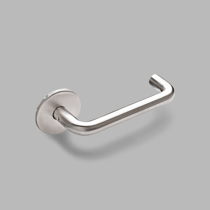 A d line Knud U Lever towel hook in stainless steel on a gray background.