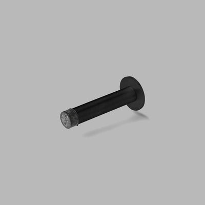 A d line Knud Wall Door Stop in black is shown on a gray background.