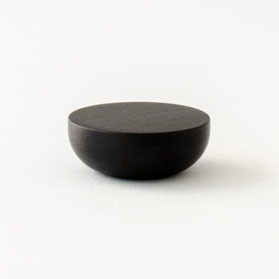 Round knob in black aluminum by Baccman Berglund