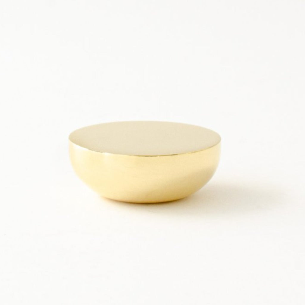 Round knob in polished brass by Baccman Berglund