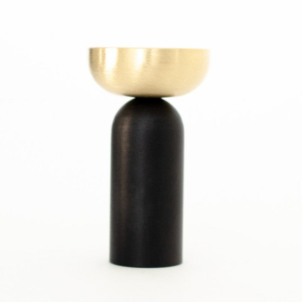 A Kokeshi Mix Hook by Baccman Berglund sitting on top of a white table.