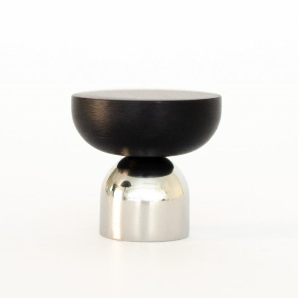 A Baccman Berglund Kokeshi Mix Knob/Hook with a black top on a white surface.