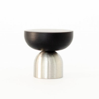 A black and silver Kokeshi Mix Knob / Hook by Baccman Berglund on a white background.