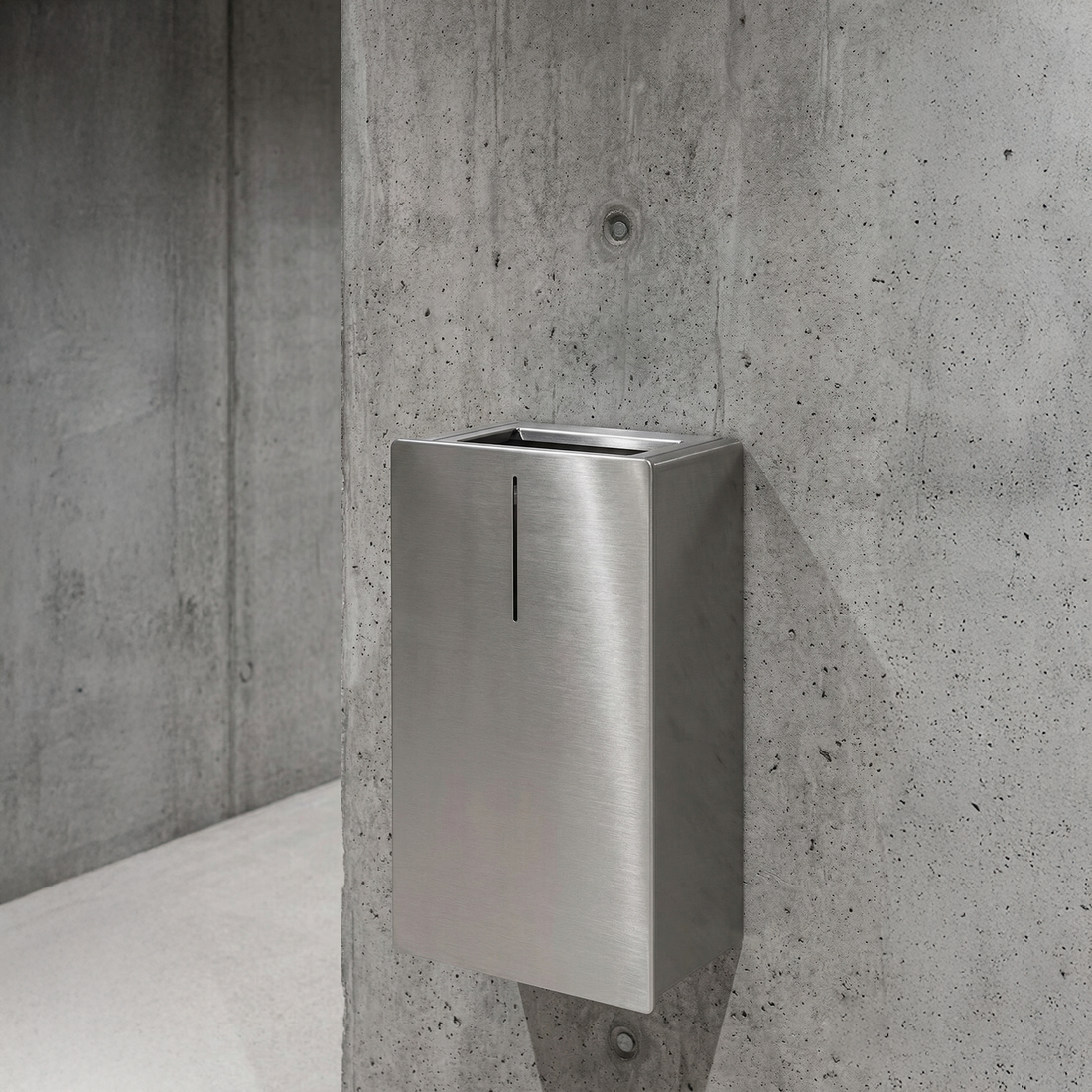 Coordinated Dan Dryer washroom showing hand dryer, dispenser, and sanitary bin in a single material language