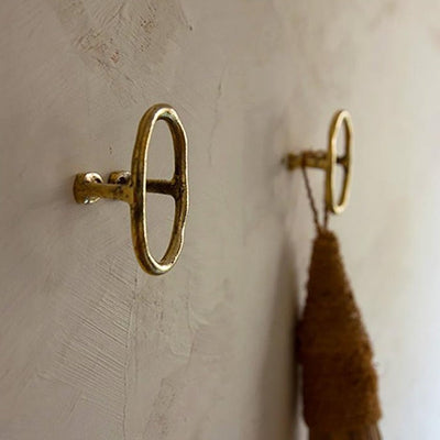 Brass casting Libre Forme No. 7 wall hook, cabinet pull, or curtain tie back designed as Jewelry hardware collection by Mi&Gei Edition.