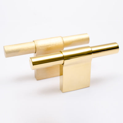 Elegant T-shaped solid brass knobs available in brushed and polished finishes.