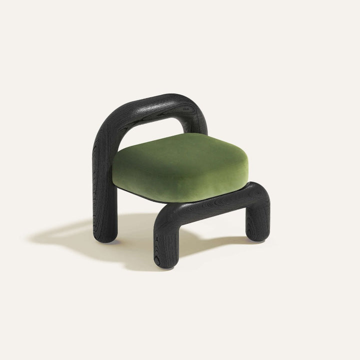 lithic lounge chair in black oak with green velvet upholstery