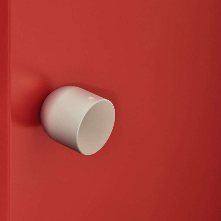 Cylindrical knob installed on door without rose