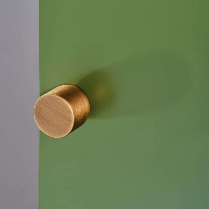 Cylindrical knob installed on door without rose