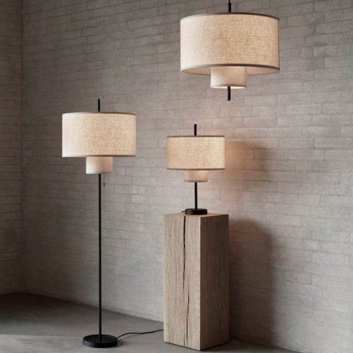 A collection of round, tiered lamps placed together