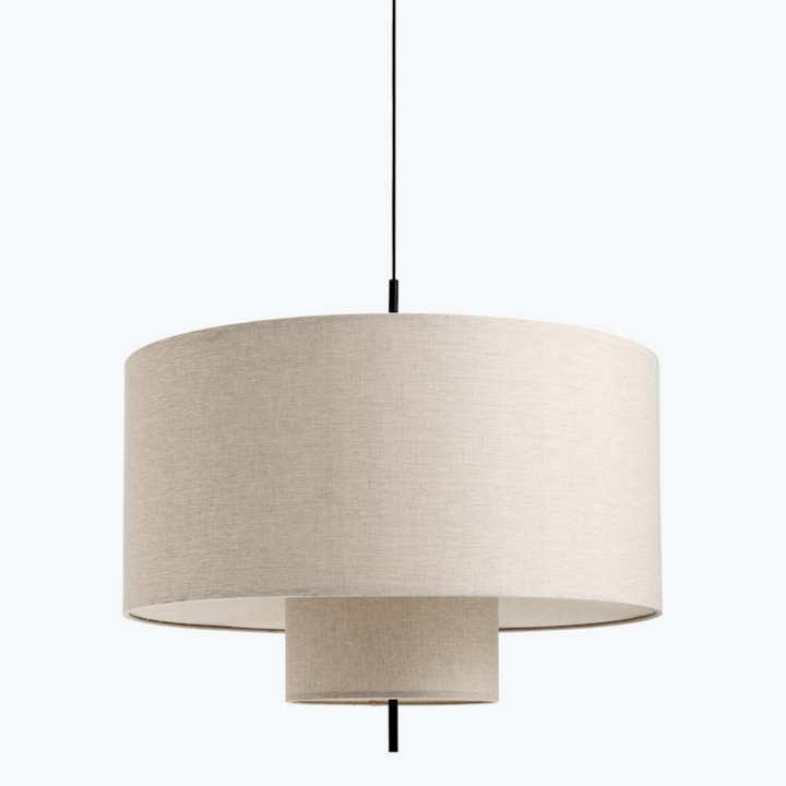 A large, round, tiered pendant lamp hung from ceiling