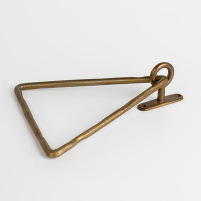A Mi & Gei Forme No. 14 Triangle Towel Ring on a white surface.