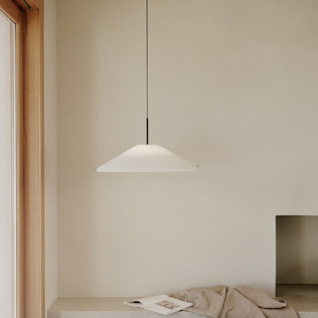 Small pendant lamp hung from ceiling