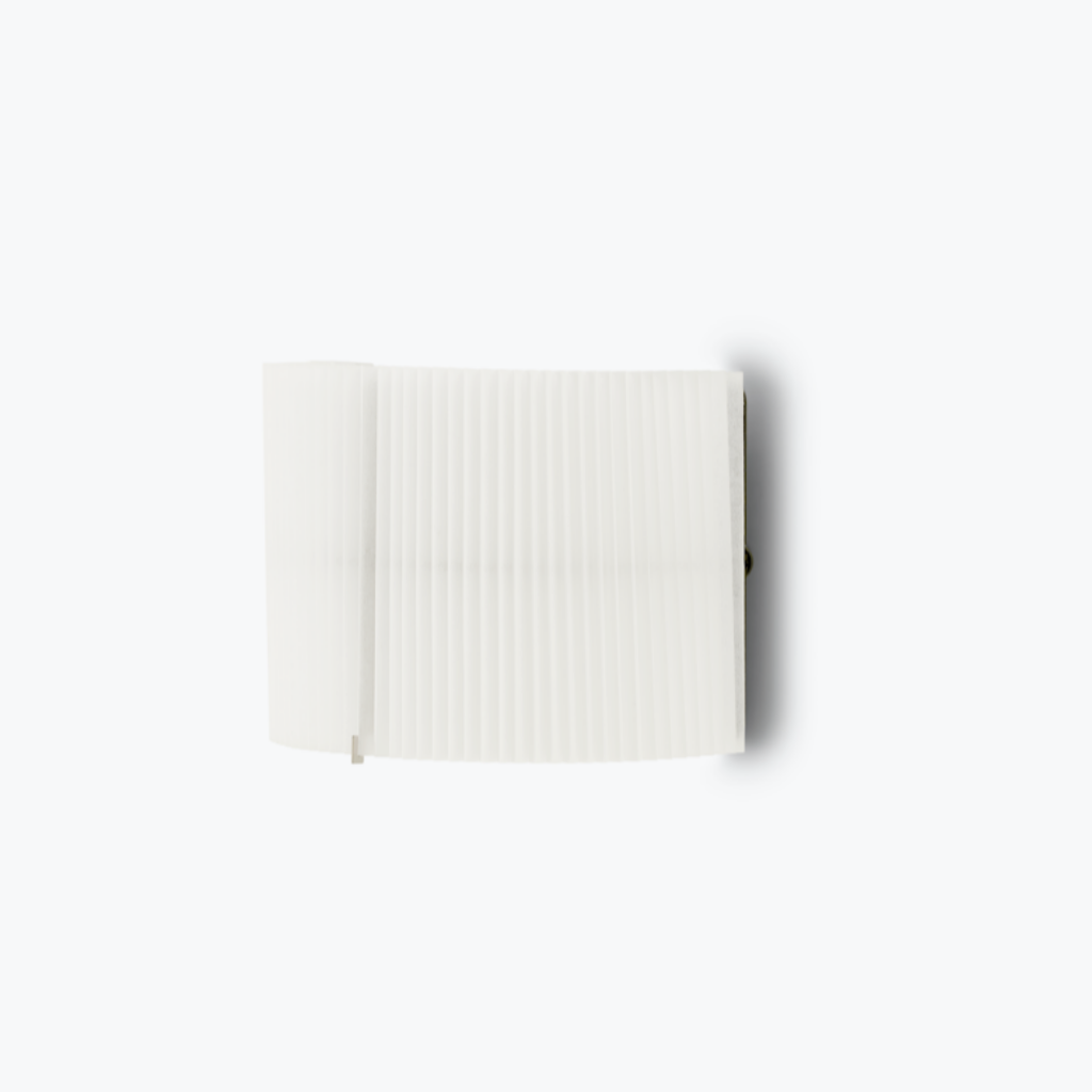 A white, pleated wall lamp