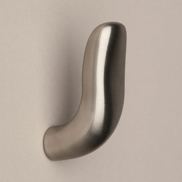 Softly curved J shaped hook in satin nickel, side view.