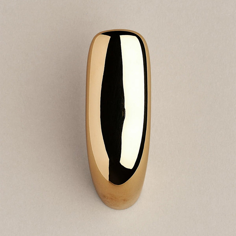 Softly curved J shaped hook in polished brass, front view.