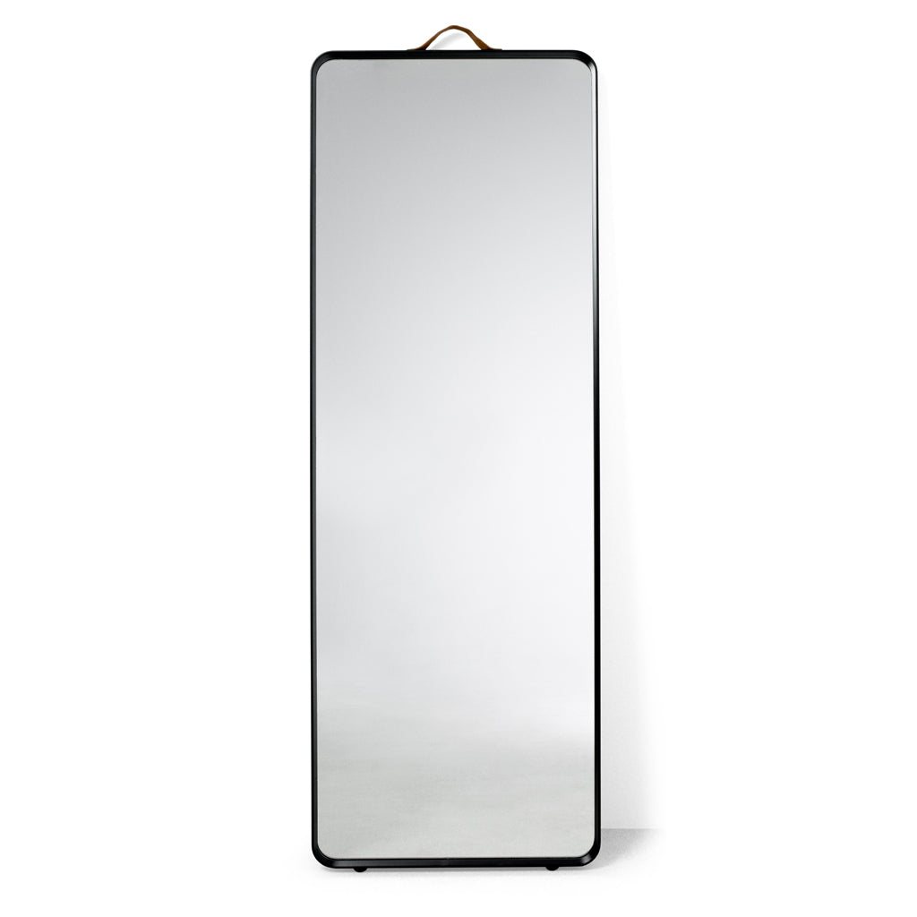 Modern and minimal floor length mirror with black frame. Designed by Norm Architects for Menu
