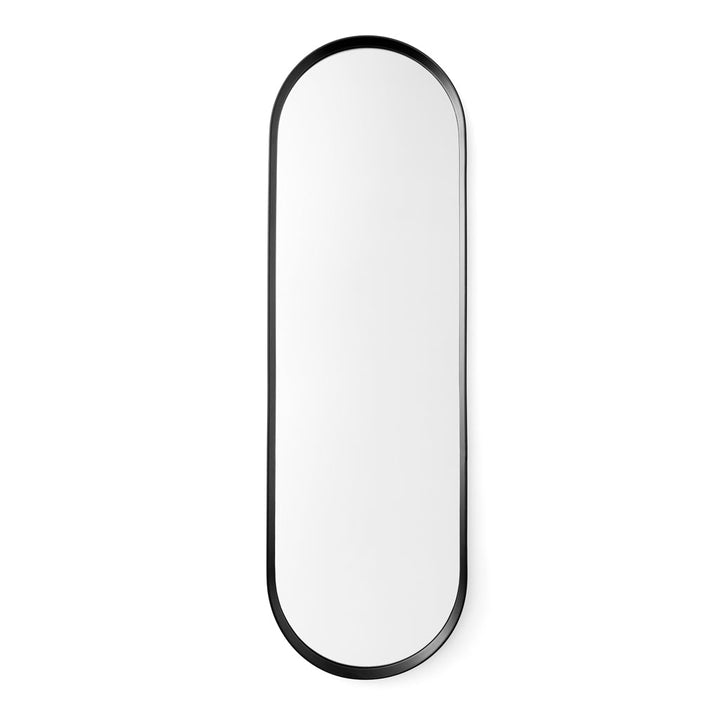 An oval wall mirror with a black powder coated frame. Designed as part of a bathroom series by Norm Architects for Menu.