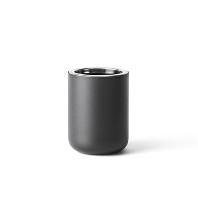 A modern toothbrush holder made of stainless steel and powder coated in matte black.