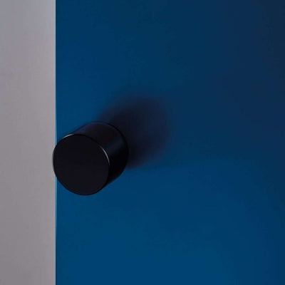 Cylindrical knob installed on door without rose