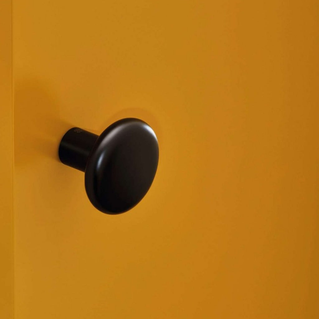 Round knob installed on door without rose